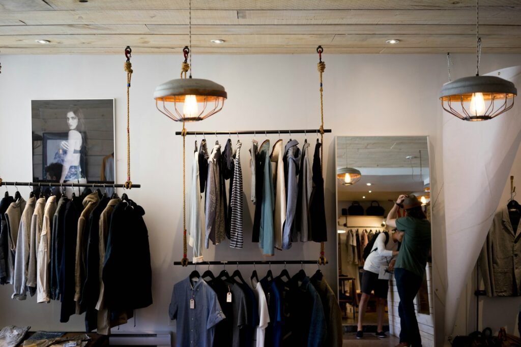 Clothing boutique interior with hanging rails